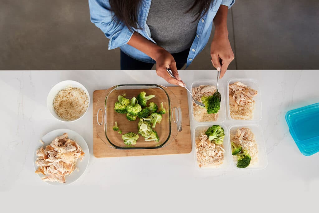 overhead view of meal prep chicken and rice