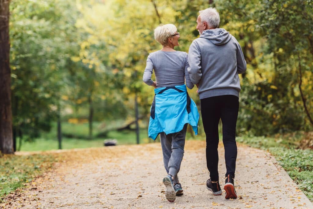 couple walking in the park - outdoor exercise example