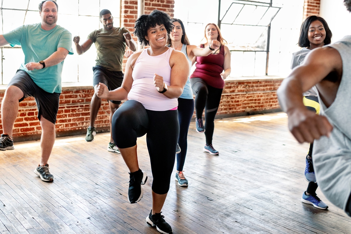 fitness class with adults doing cardio