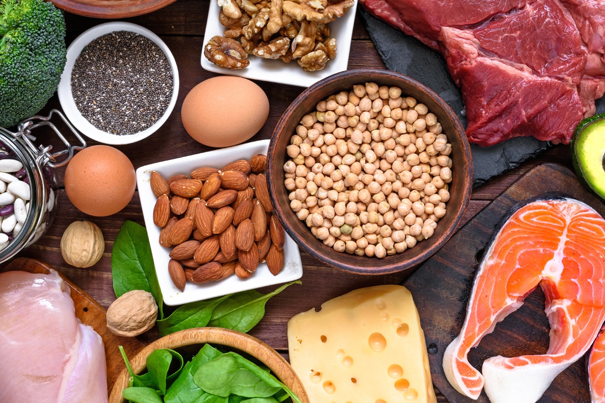 high-protein foods with beans, chicken, fish, cheese, legumes